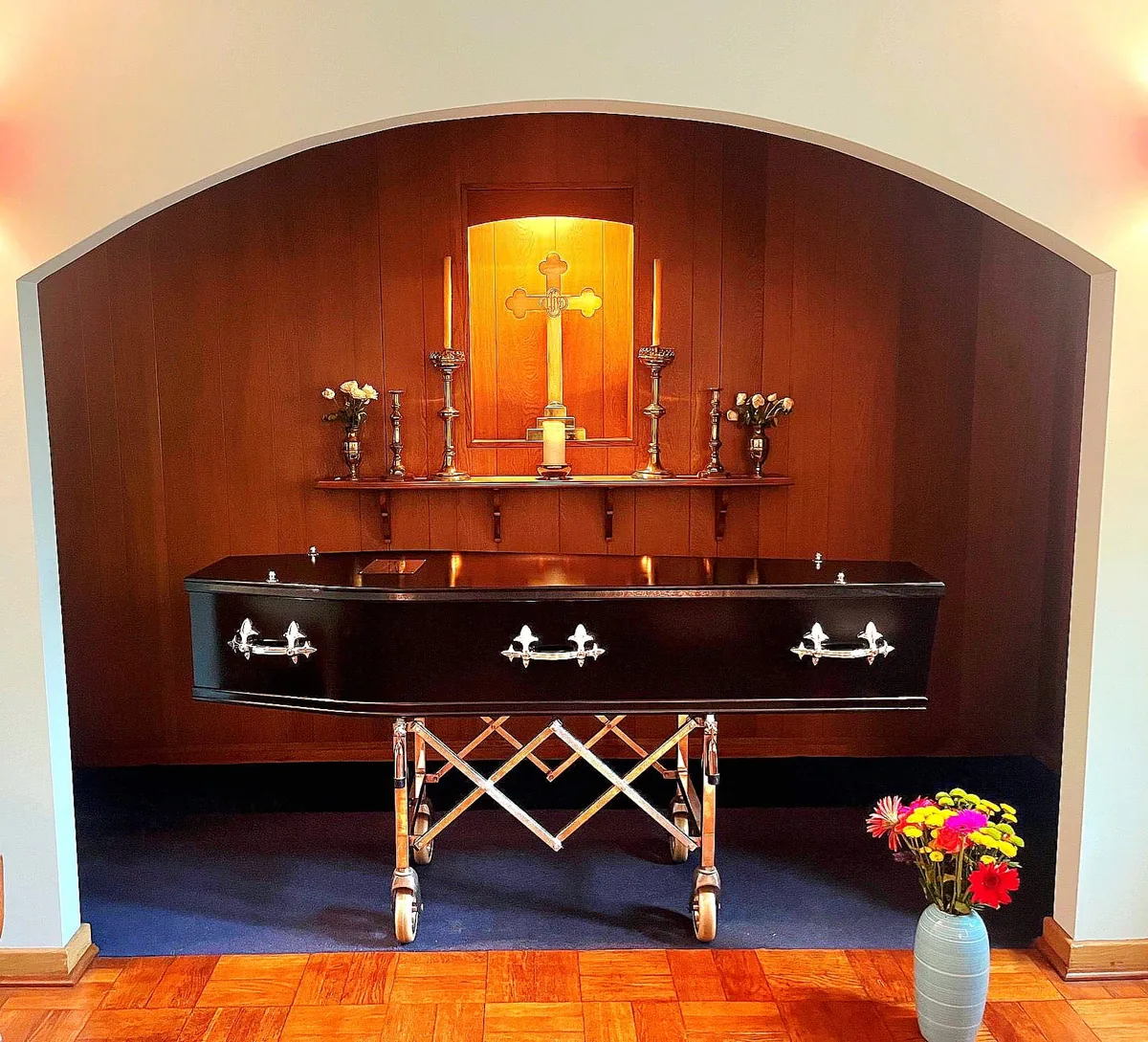 Dark wood coffin in the Chapel of Rest